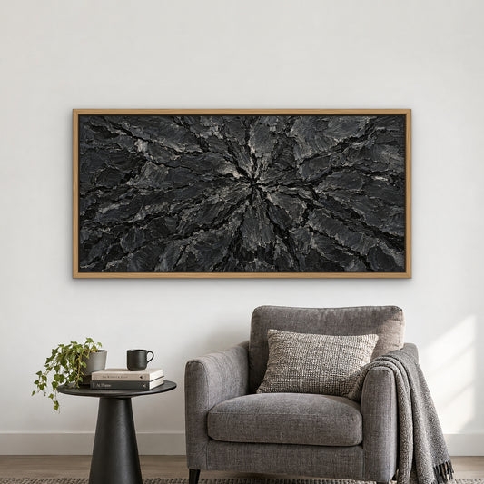 Obsidian Relief, black and white abstract hand-painted canvas wall art in a reading corner – Gallery 23